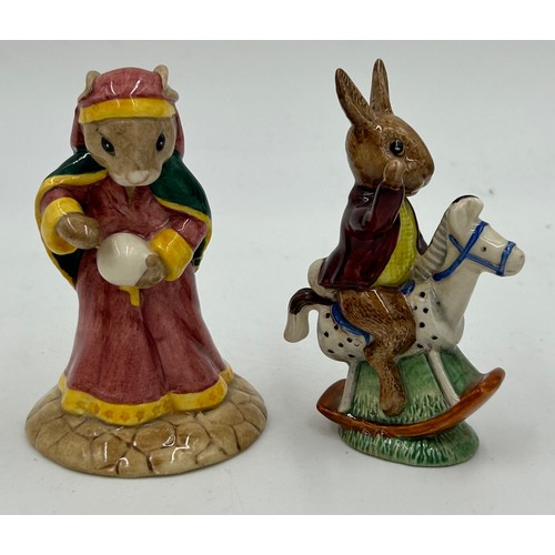 263 - Five Royal Doulton Bunnykins to include Fortune Teller DB218 signed to base, Choir Singer DB223, Vic... 