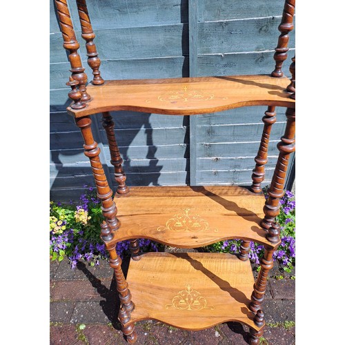 80 - A 19thC walnut four height whatnot with inlay to the graduating shelves. 140cm h x 53cm w x 32cm d.