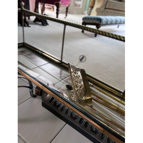 965 - Brass fender, 126cm x 38cm internal, mirrored fire guard 76cm h x 42cm w, fire irons to include poke... 