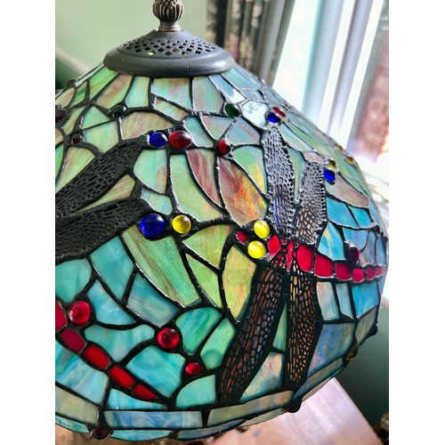 1021 - Tiffany style glass lamp with dragonfly decoration. 60cm h.