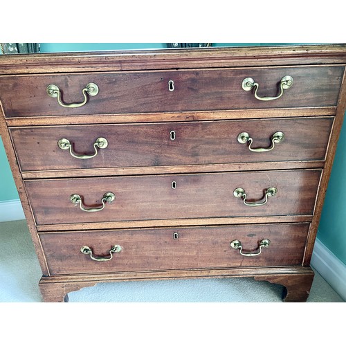 76 - A 19thC mahogany chest of 4 graduated drawers on bracket feet with brass swan necked handles. 89cm w... 