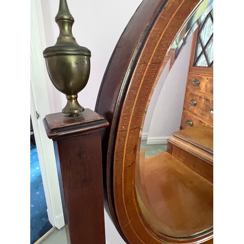 77 - An Edwardian mahogany inlaid wardrobe and dressing table. The wardrobe with single door, 3 short dra... 