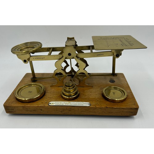 1263 - A miscellany to include a set of vintage brass postage scales by S. Mordan & Co., a set of brass and... 