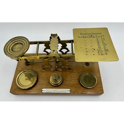 1263 - A miscellany to include a set of vintage brass postage scales by S. Mordan & Co., a set of brass and... 