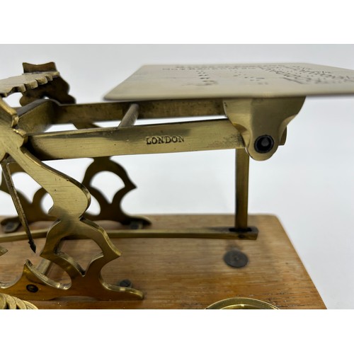 1263 - A miscellany to include a set of vintage brass postage scales by S. Mordan & Co., a set of brass and... 