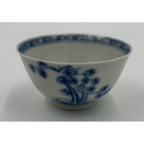 256 - A 18thC Nanking Cargo tea bowl 4cm h and saucer 11.7cm d  with underglaze blue painted decoration of... 