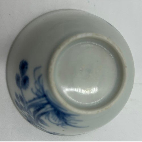 256 - A 18thC Nanking Cargo tea bowl 4cm h and saucer 11.7cm d  with underglaze blue painted decoration of... 