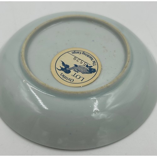 256 - A 18thC Nanking Cargo tea bowl 4cm h and saucer 11.7cm d  with underglaze blue painted decoration of... 