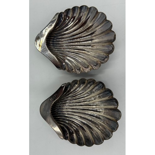 810 - Hallmarked silver to include : two shell shaped dishes on three ball feet, Birmingham 1902 by Atkin ... 