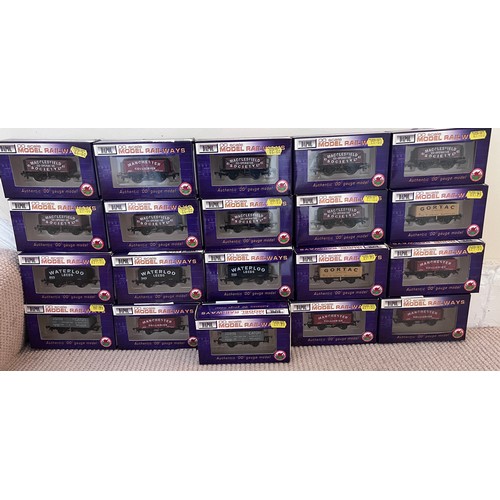 1128 - A large quantity of boxed Dapol OO scale wagons. (22)