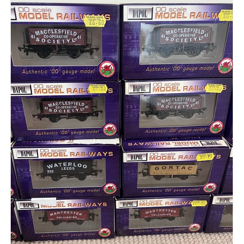 1128 - A large quantity of boxed Dapol OO scale wagons. (22)