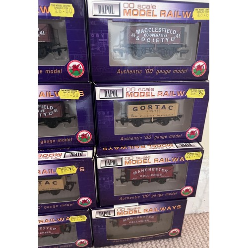 1128 - A large quantity of boxed Dapol OO scale wagons. (22)