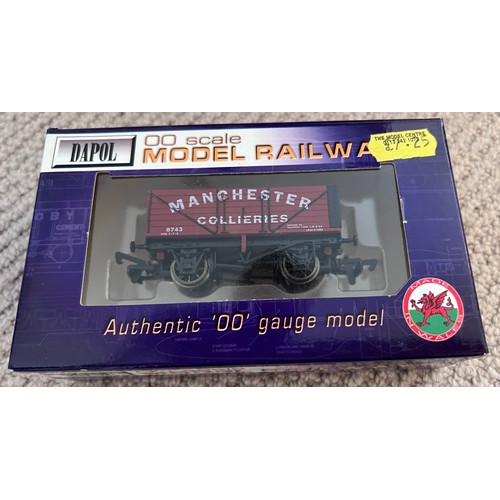 1128 - A large quantity of boxed Dapol OO scale wagons. (22)