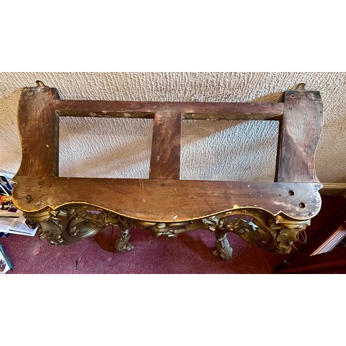 95 - A gilt plaster console table with white marble door. 87 h x 84 w x 39cm h.