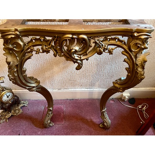 95 - A gilt plaster console table with white marble door. 87 h x 84 w x 39cm h.