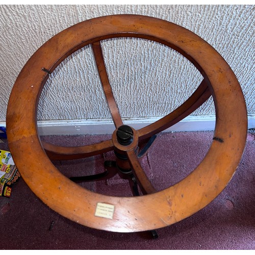 93 - A 20thC terrestrial globe on wooden stand. 97cm h.