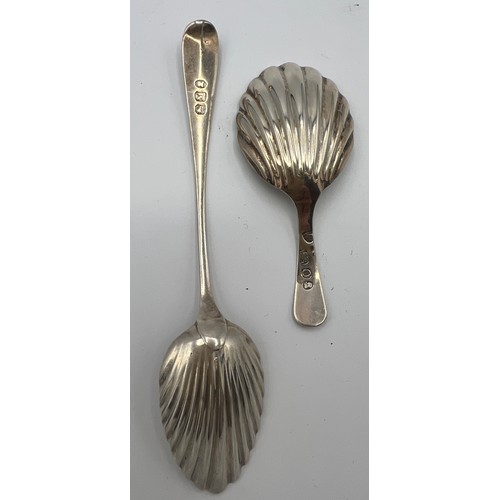 809 - A George III silver caddy spoon, London 1809, maker Thomas Wallis together with a teaspoon London 18... 