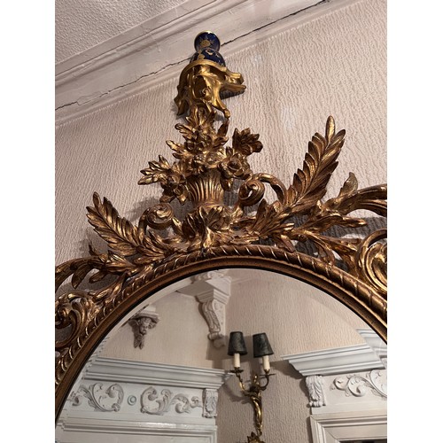 1236 - A 20thC decorative gilt bevel edged wall mirror. 142cm h x 79cm w.