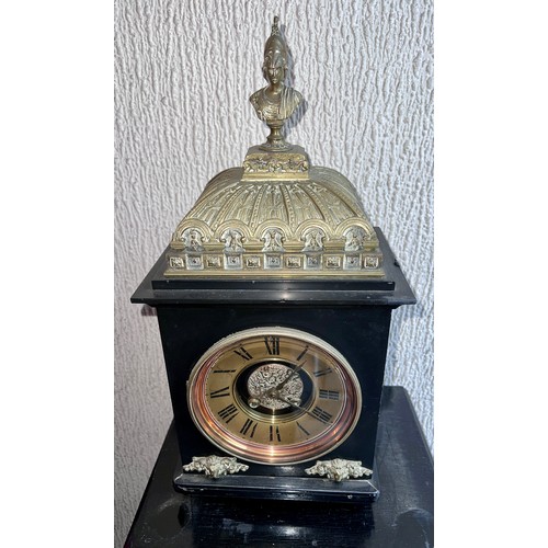 988 - A 19thC black marble mantle clock 47cm h.