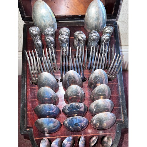 946 - An 18thC mahogany serpentine fronted knife box containing later plated cutlery. 39cm h x 33cm w x 31... 