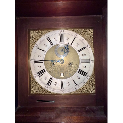 991 - An 18thC 8 day mahogany longcase clock with broken pediment top and brass face by R Henderson, Scarb... 