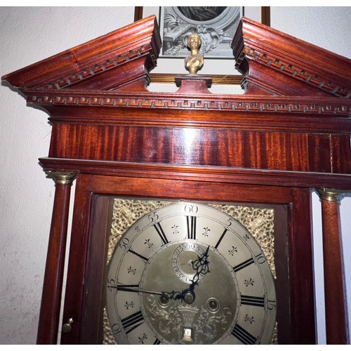 991 - An 18thC 8 day mahogany longcase clock with broken pediment top and brass face by R Henderson, Scarb... 