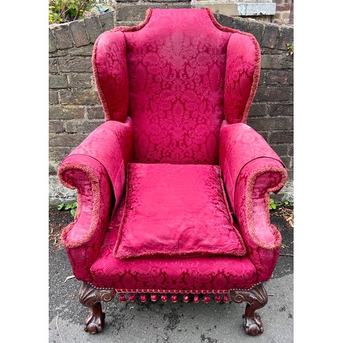 73 - A good quality wing armchair with cabriole legs and ball and claw feet to front. 108cm h to back, 75... 