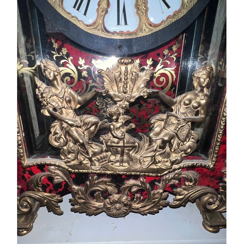 989 - A boulle mantel clock with brass mounts. Movement marked to back Lauris. 86cm h x 39cm w x 15.5cm d.