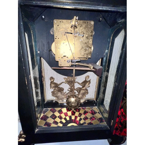 989 - A boulle mantel clock with brass mounts. Movement marked to back Lauris. 86cm h x 39cm w x 15.5cm d.