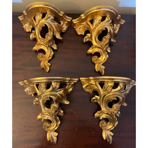 1271 - Four decorative gilt wall mounted brackets. 22cm h.