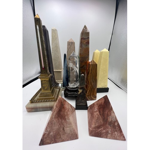 1274 - A collection of agate, glass, brass and granite obelisks and two pyramids. Tallest 30.5cm.