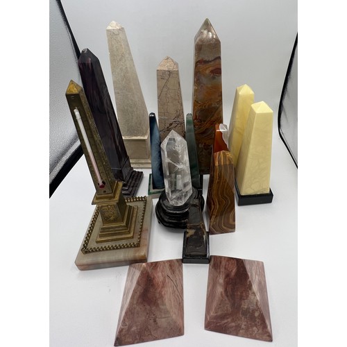 1274 - A collection of agate, glass, brass and granite obelisks and two pyramids. Tallest 30.5cm.