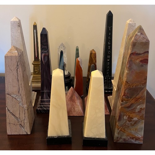 1274 - A collection of agate, glass, brass and granite obelisks and two pyramids. Tallest 30.5cm.