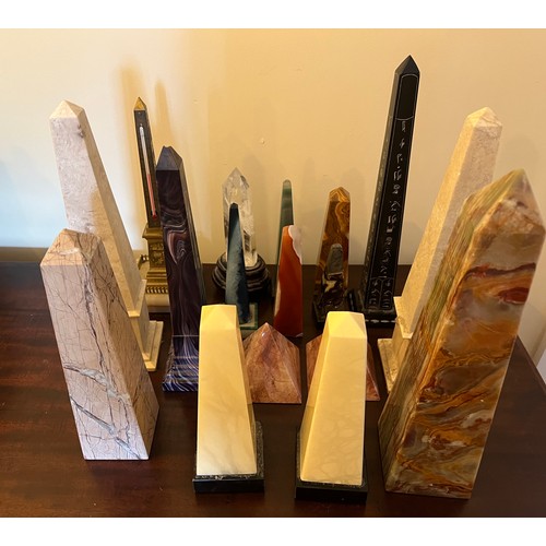 1274 - A collection of agate, glass, brass and granite obelisks and two pyramids. Tallest 30.5cm.