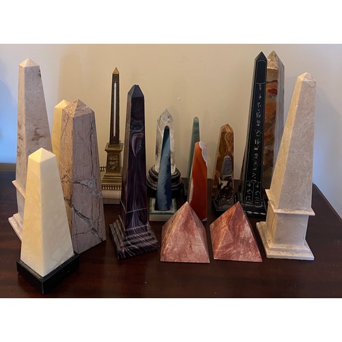 1274 - A collection of agate, glass, brass and granite obelisks and two pyramids. Tallest 30.5cm.