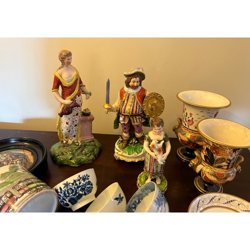 249 - A quantity of 18thC and 19thC English ceramics to include tea bowls, saucers, figurines, pot lid and... 