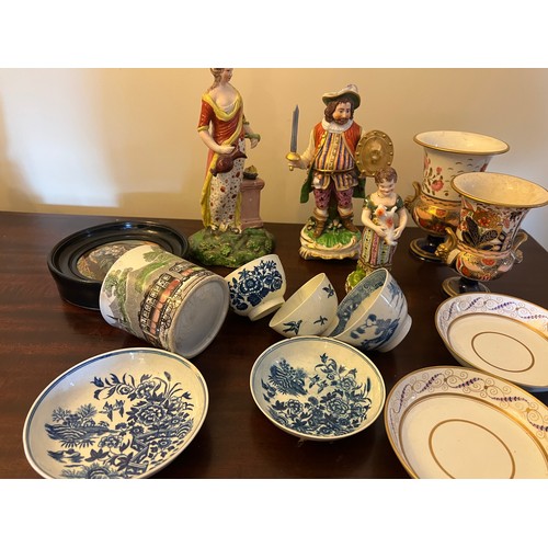 249 - A quantity of 18thC and 19thC English ceramics to include tea bowls, saucers, figurines, pot lid and... 