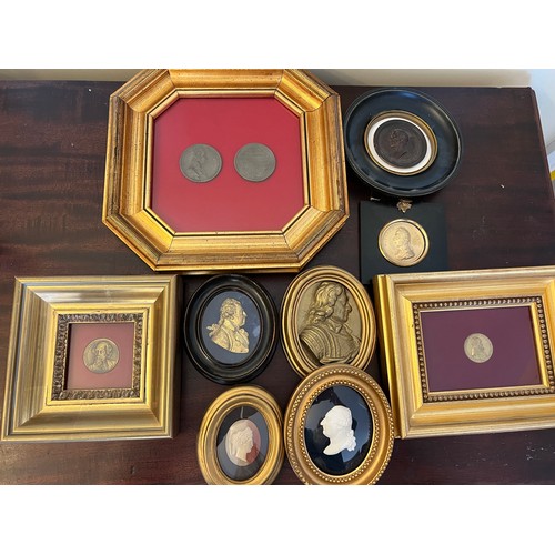 1278 - A quantity of framed silhouettes, medals etc including brass, bronze and plastic.