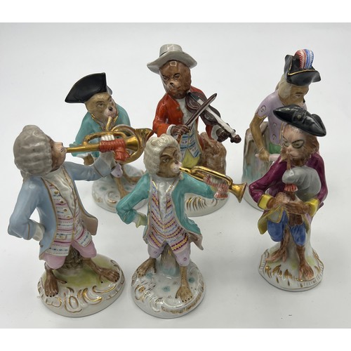 238 - A collection of 17 continental porcelain monkey band figures after Meissen.