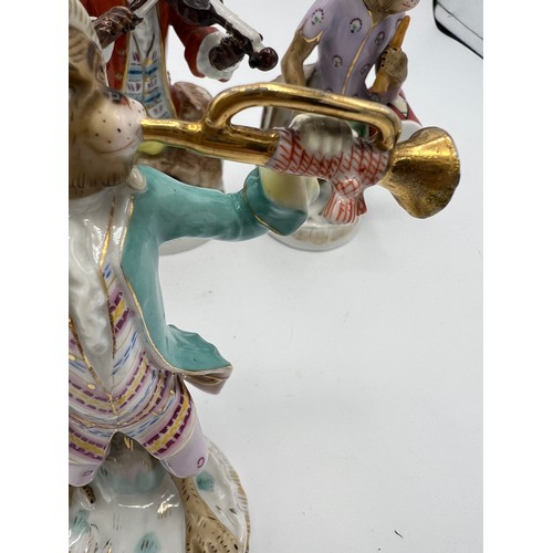 238 - A collection of 17 continental porcelain monkey band figures after Meissen.