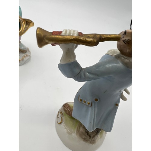 238 - A collection of 17 continental porcelain monkey band figures after Meissen.