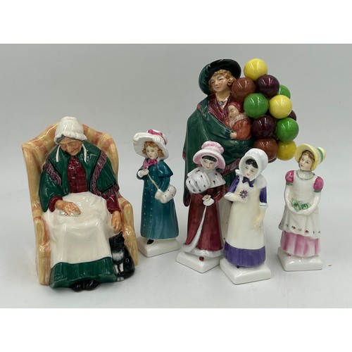 243 - Royal Doulton figurines to include: The Balloon Seller HN583 23cm h, Forty winks HN1974 17cm h, Carr... 