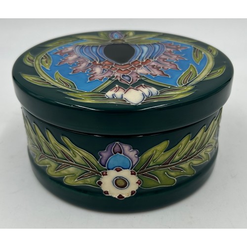 244 - A Moorcroft lidded bowl in the 'Saadian' pattern designed by Shirley Hayes, dated 2001, 8.5cm h.