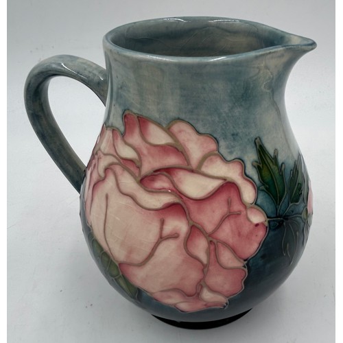 246 - A Moorcroft Collectors Club jug in the Rose pattern after the original by Sally Tuffin, impressed Mo... 