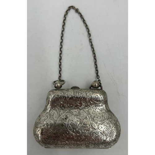 812 - Hallmarked silver purse George Unite London 1889 and a jug raised on three feet Birmingham 1915, mak... 