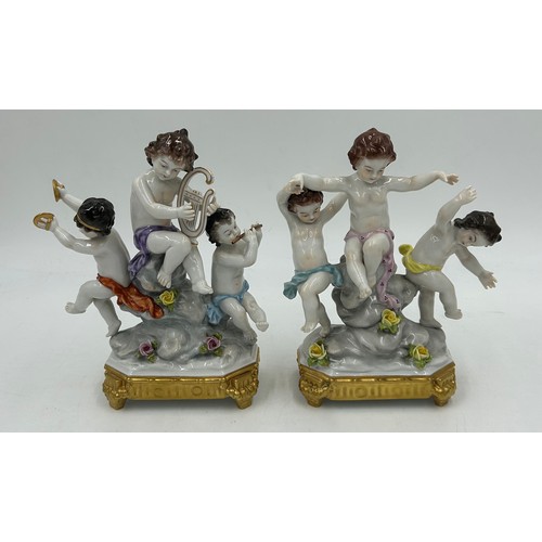 229 - A selection of 20th Century European Porcelain figurines to include a pair of Three Volkstedt Cherub... 