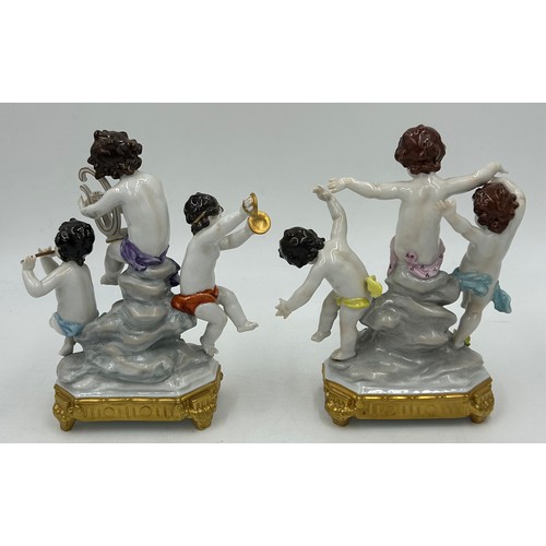 229 - A selection of 20th Century European Porcelain figurines to include a pair of Three Volkstedt Cherub... 