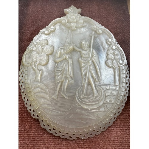 1286 - A Mother of Pearl carved nativity scene from Jerusalem in a mahogany circular glazed frame with a re... 