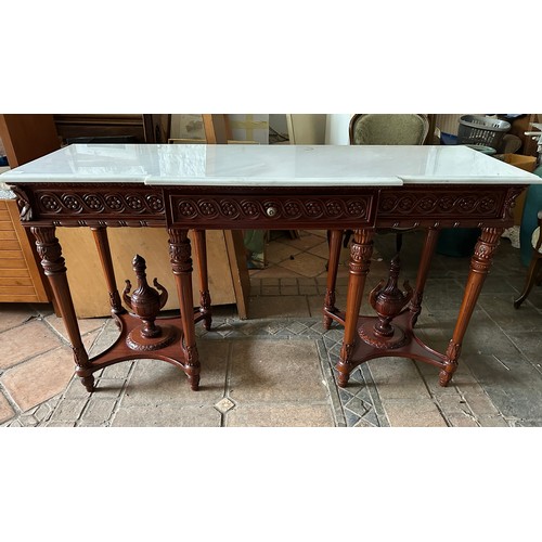 67 - A reproduction marble topped side table.