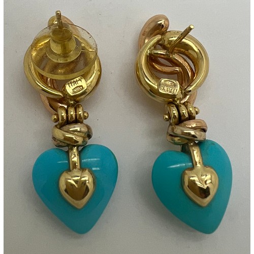 688 - A pair of 18 carat gold and turquoise heart shaped drop earrings. Total weight 9.8gm. 3.6cm l.